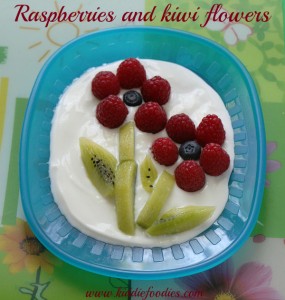 Fresh fruit flower, raspberries and kiwi, easy recipe for healthy dessert