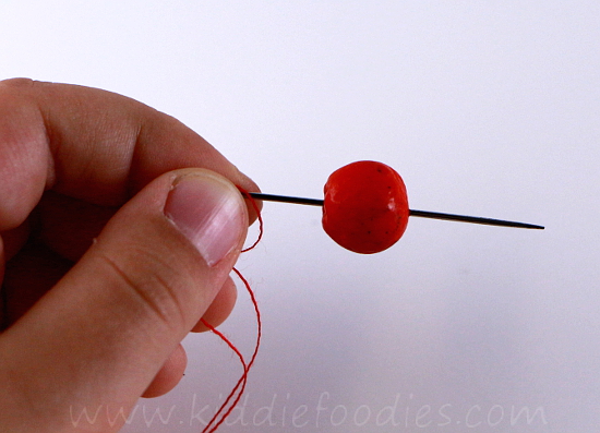 DIY rowanberry necklace - fine motor skills activity for kids step2a