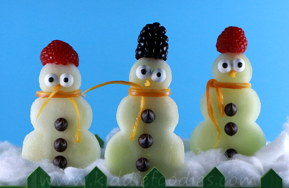 Snowman made with fruits on a stick, easy Holiday treats for kids step3